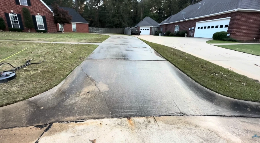 Stained concrete driveway before pressure washing in Jacksonville, FL