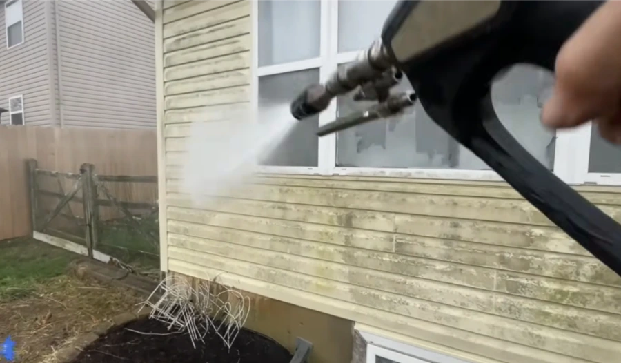 Soft wash in progress on vinyl siding in Jacksonville, FL