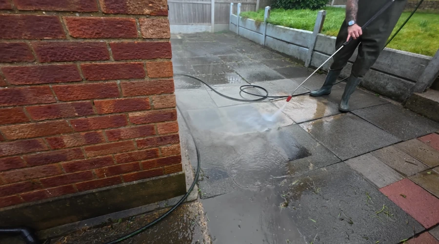 Paver patio pressure washing showing dirty vs clean contrast in Jacksonville, FL
